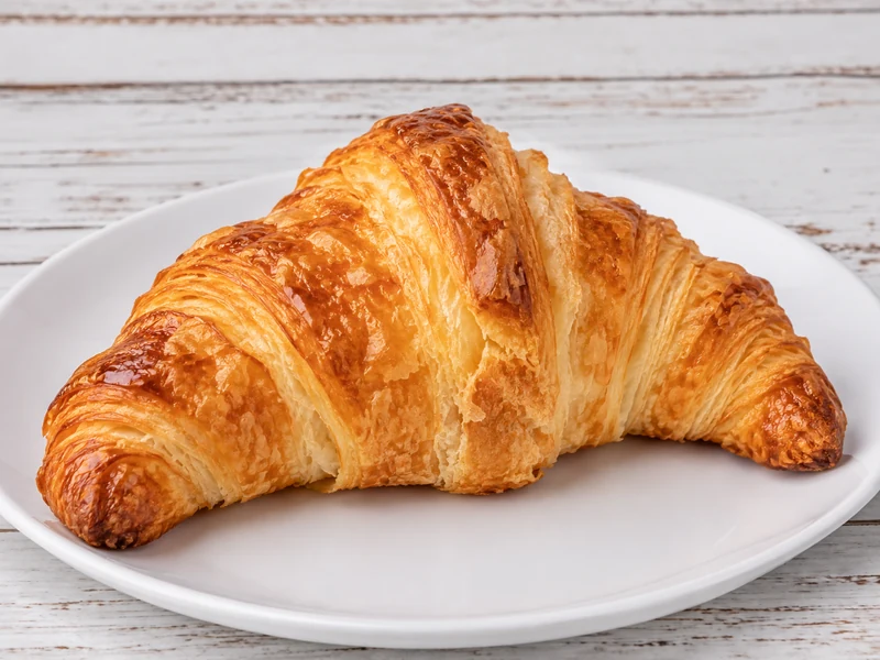 Original Butter Croissant on a simple white plate