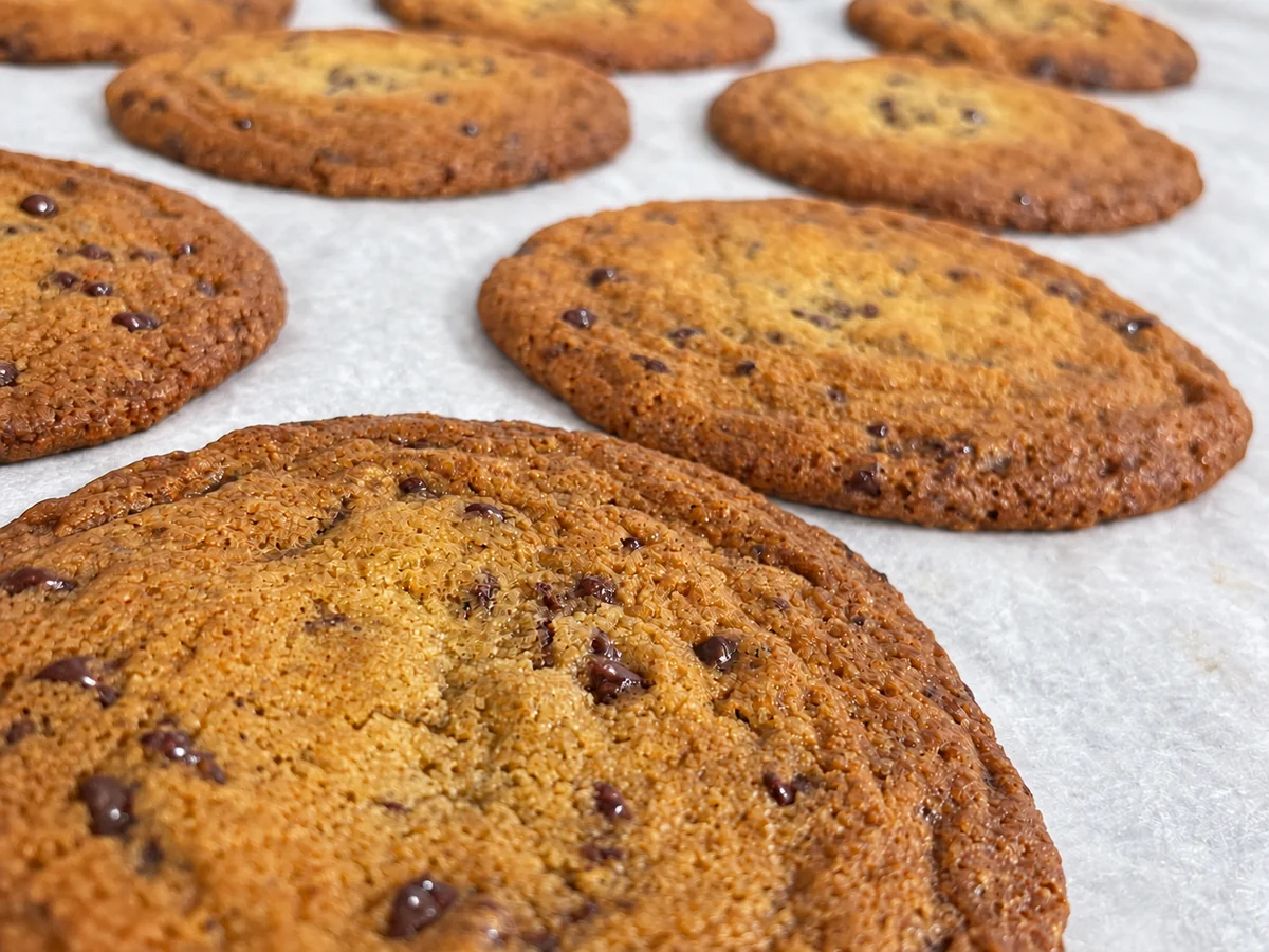 SOS Counter’s golden brown chocolate chip cookies on parchment
