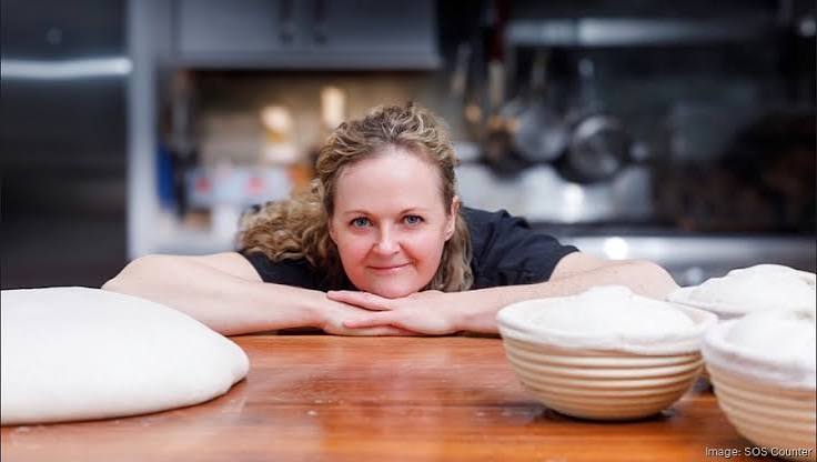 An SOS Counter chef behind the kitchen counter