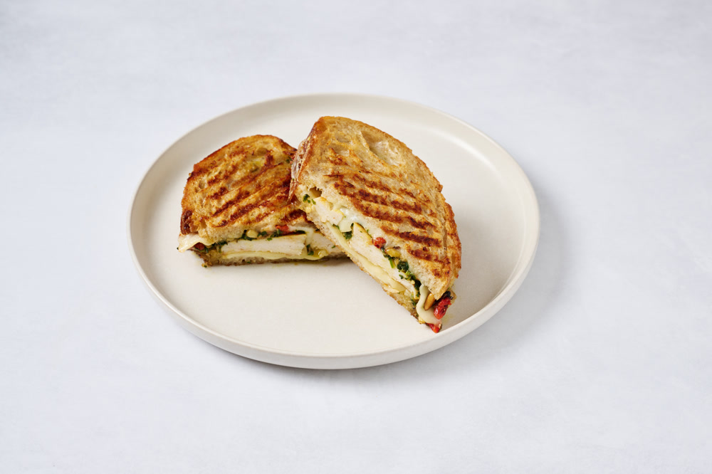 SOS Counter’s Italian Flag Panini with chicken, mozzarella, pesto, and roasted peppers